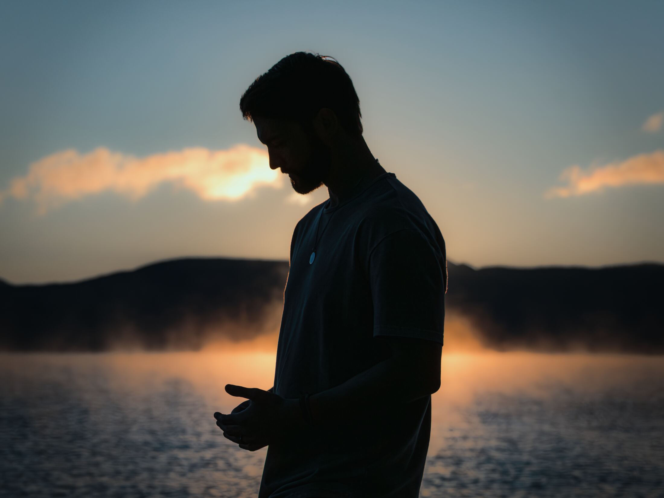 MKE in silhouette at sunrise over Lake Tahoe
